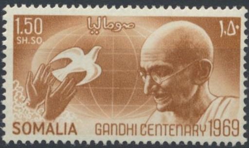 Gandhi, Globe and Hands Releasing Dove