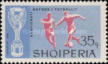 Jules Rimet Cup and scene of football play