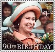 The Queen wearing red and white hat