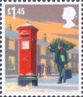 Man carrying Christmas Tree past Post Box