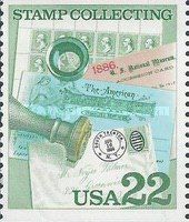 Sheet of Stamps, Handstamp and Magnifying Glass