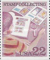 Boy Holding Stamp in Tweezers