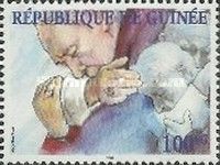 Pope John Paul II Hugging man